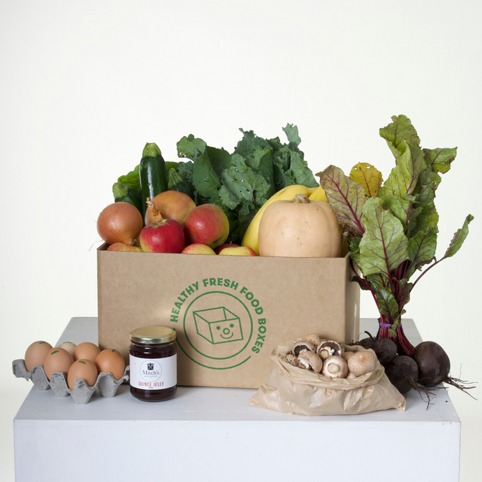 The Gluten-Free Box pictured is packed with organic fruits and vegetables like apples, beetroot, pumpkin, bananas, zuchini, onions, and more. There is also a bag of mushrooms, half a dozen eggs, and a jar of quice jelly as the Grocery Surprise.